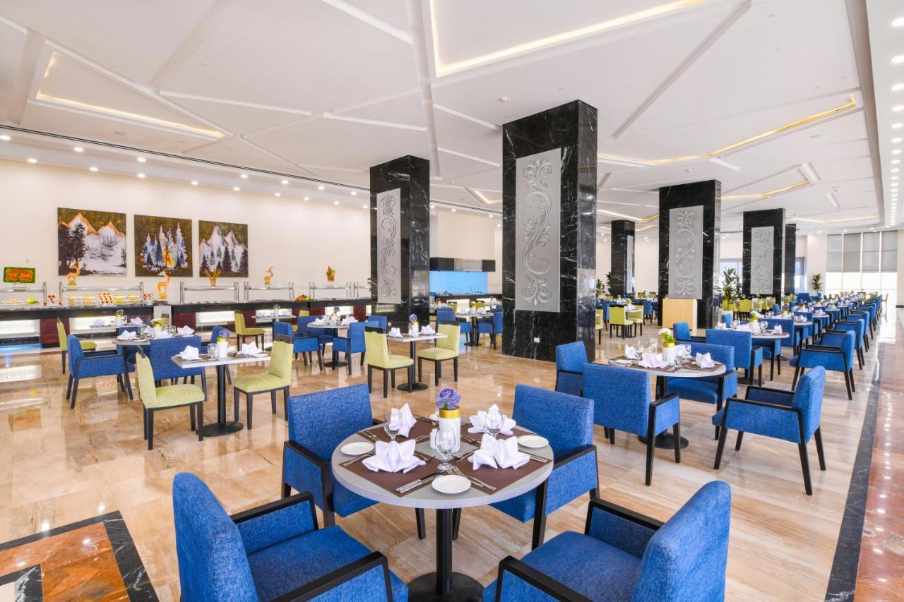 Tolip Gardens Hotel Kairo Exteriör bild The restaurant