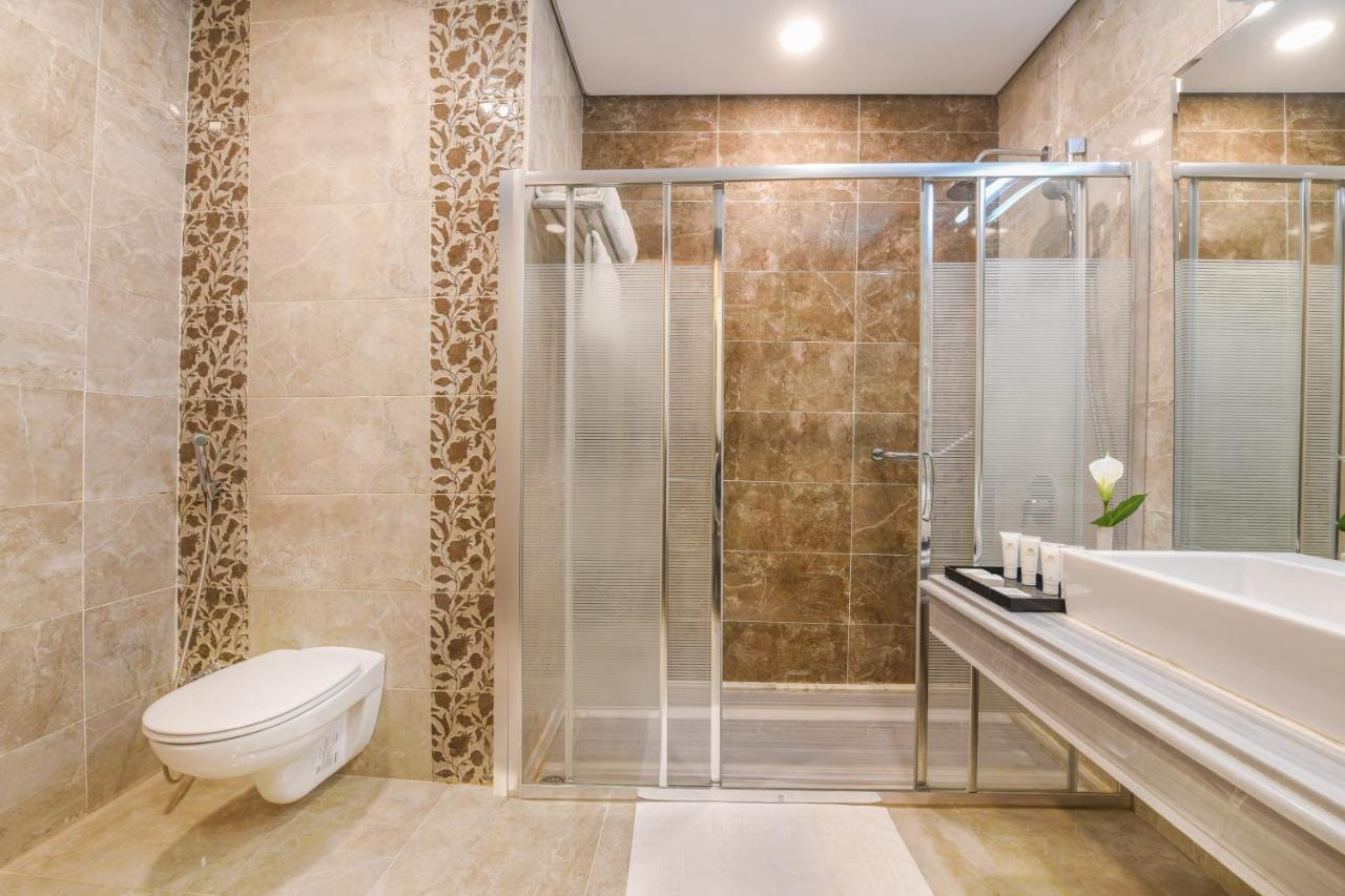 Tolip Gardens Hotel Kairo Exteriör bild A shower enclosure