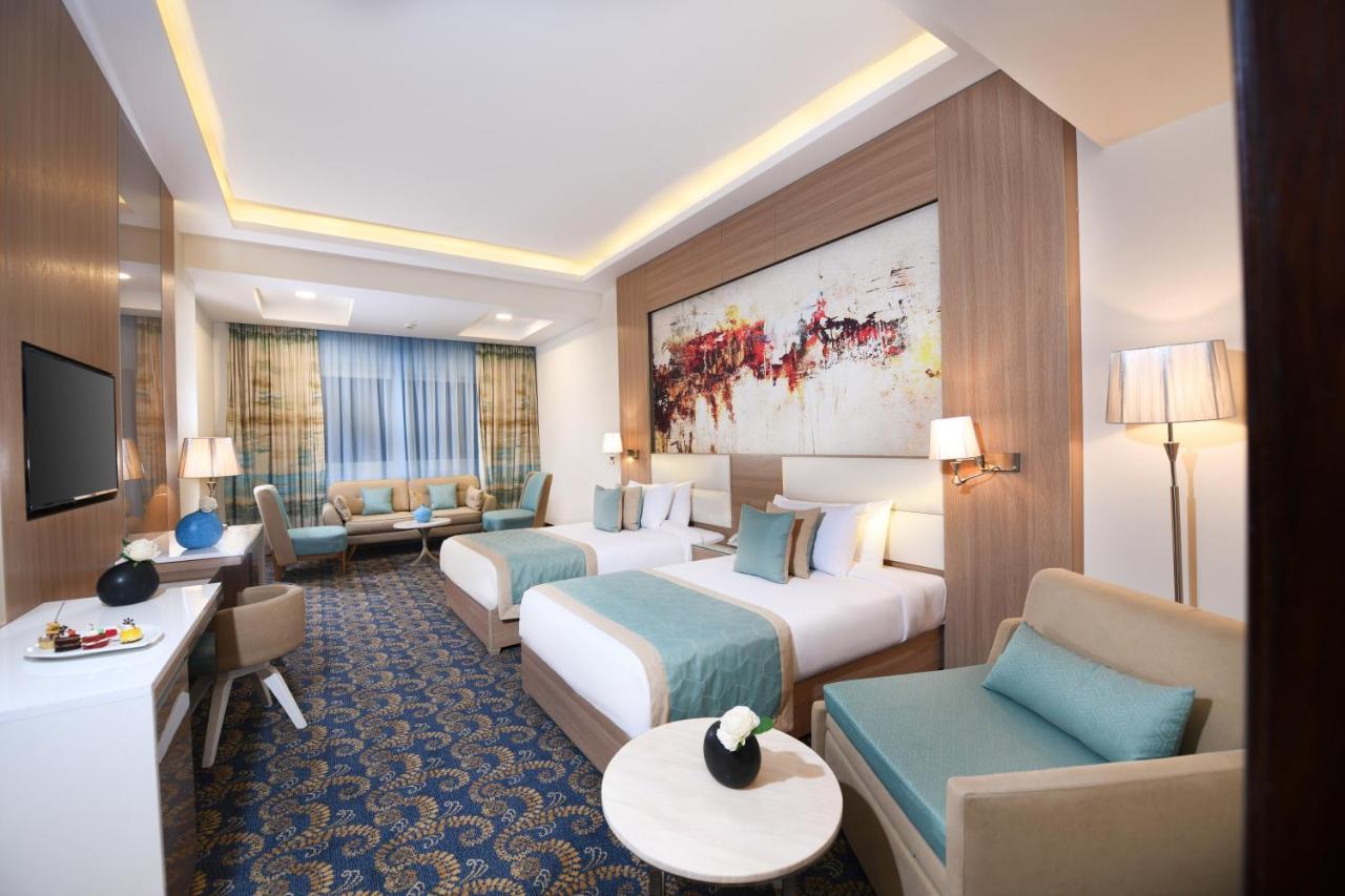 Tolip Gardens Hotel Kairo Exteriör bild Family room